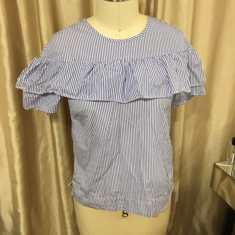 J. Crew ruffle shoulder blouse.